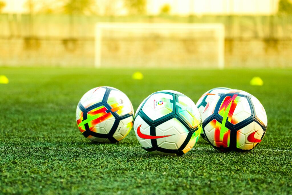 Soccer balls on field